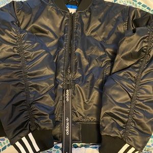 brown and black adidas jacket